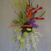 Pastel colors, mix of roses, lilies, hydrangeas, lisianthus.  Please see more