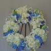 Pastel colors, mix of roses, lilies, hydrangeas, lisianthus.  Please see more