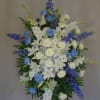Pastel colors, mix of roses, lilies, hydrangeas, lisianthus.  Please see more
