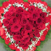 For a personal tribute of endearing love, this heart spray has red