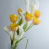 A stunningly architectural arrangement designed with grace and style - Calla Lilies