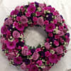  This 22&quot; wreath of beautiful lavender and purple flowers are a