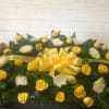 This over the head casket spray is final tribute for your loved