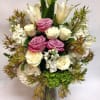 This arrangement comes complete with lavender and white roses, casa blanca lilies