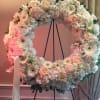 Hydrangea, mini gerbera daisy, roses, white orchids. 