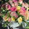 A beautiful mix of all David Austin roses with dusty miller, helleborus
