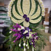 Beautiful funeral spray including all premium fresh flowers: orchid, calla lily, lily