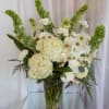 White alstroemeria, snapdragons and stock in a beautiful vase is a gift