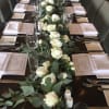 Custom Communal Hand-Tied Floral Table Runner. A custom hand tied eucalyptus and