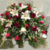 Our &quot;Peaceful Passing&quot; casket cover is a tribute in red and white.