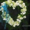 An expression of love in grenn and white,  This graceful heart