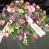 This is a stunning display of roses, hydrangeas, snapdragons ,alstroemeria and luscious