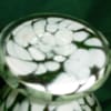 This mid century HAND BLOWN, ART GLASS VASE is a captivating blend