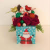 Fresh Roses, jingle balls, bird displays, pine cones, and Santa&#039;s treats all
