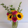 A sweet combination of fresh roses and sunflowers. Perfect for any living