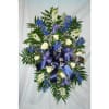 Lovely arrangement for funeral. Product ID: irisdragonrosesprayfuneral

