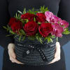 Our romantic Hatbox is concocted with Rose Explorer, Montreux phalaenopsis and Pistache