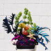 Like colorful Coral Reef, this design includes pin cushion, bell of Ireland