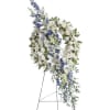 Beautiful wreath of blue and white flowers in a contemporary design includes