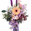 A beautiful and regal mix of flowers that is sure to uplift