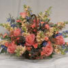 This basket is filled to overflowing with an assortment of garden type