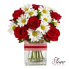 A simple and elegant combination of daisies and red roses. 