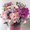 Designer arrangement of gorgeous fresh blooms.