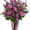 Vivid and vibrant, this assortment of fresh flowers brims with exquisite beauty