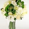 A natural hand tied of white  hydrangeas,roses,lisianthus,dahlias, and kales, greenery and