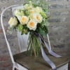 Designer&#039;s expert choice of seasonal bright white and creamy ivory blooms are