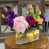 The colors of this amazing arrangement of roses, tulips, hydrangeas  and