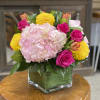 Need an arrangement that reminds you to smile? This beautiful mix of