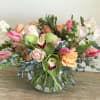 A bright and cheerful mix of seasonal blooms. An assortment of pinks