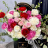 Scarlet Ranunculus (commonly called Persian buttercup) takes center stage along with a
