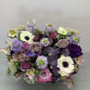 A wonderful mixture of dark colors with flowers such as roses and