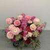 A beautiful fusion of ranunculus and other flowers.