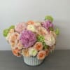 Mixture of roses, peonies, and other perfect flower choices.