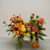 A mixture of our closest orange toned flowers. Asymmetrical beauty with the