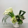A beautiful and unique design with flowers such as orchids, roses, calla