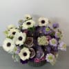 An elegant arrangement filled with mixtures of our most beautiful combinations that