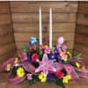 A beautiful array of colorful flowers with Easter inspired decorations
