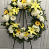 Gorgeous yellow daisies, yellow lilies, yellow gerbera daisies surrounded with white hydrangeas