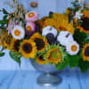 Be Happy and dance- sunflowers arrangement with some mix of the seasonal