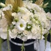 This beautiful modern box of mix white flowers are great for any