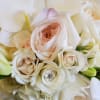 beautiful hand wrapped bouquet with garden roses and orchids.

Flowers and similar colors