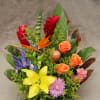 Bird paradise, Ginger, Gerbera Daisy, Blue Dutch Iris, Tea Leaf, Orange Roses