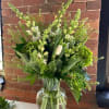 Classic green and white arrangement will have you dreaming of the Irish