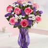 Featuring a unique variety of blooms in a harmony of pinks, whites