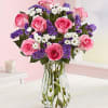 Featuring a unique variety of blooms in a harmony of pinks, whites