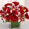 Two of our most popular flower choices- this compact arrangement includes roses